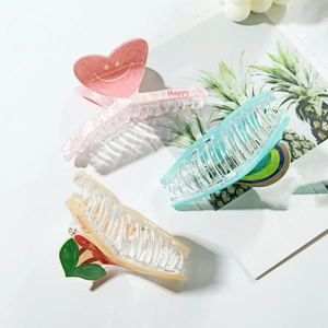 Summer style acetate hair clips with cherry and rainbow patterns in pastel colors