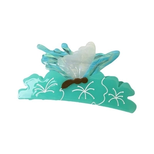 Mint green acetate hair claw clip featuring a translucent blue and white butterfly