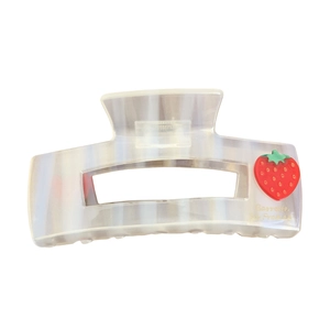 Sweet cream square acetate hair claw with red strawberry design and gold Barrette lettering