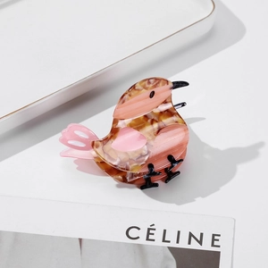 Chic bird-shaped acetate hair claw clip with brown tortoiseshell and pink patterns