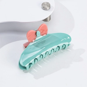 Pinza per capelli shark in acetato verde menta con fiocco rosa e fiori da donna