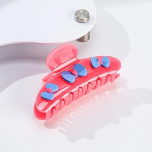 Pinza per capelli in acetato rosa con fiocchi blu e strass per acconciature