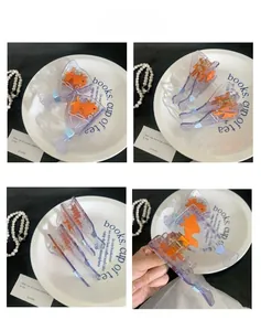 Détails du clip à cheveux créatif en forme de sac de poisson rouge en acrylique violet