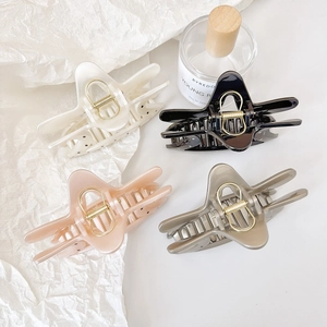 Elegant butterfly hair claws in four colors with pearl finish and strong metal spring