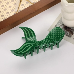 Green mermaid tail hair claw clip with scale texture for women's elegant hairstyles