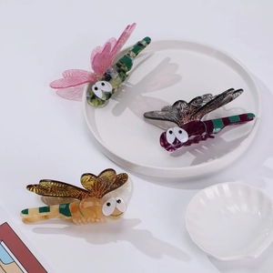 Handcrafted acetate dragonfly hair claws in marble and tortoise patterns, set of three colors