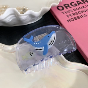 Blue whale and fish pattern on a translucent acetate hair claw clip for women