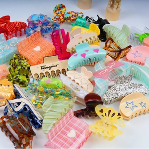 Assorted acetate hair claws and clips with leopard print and geometric patterns
