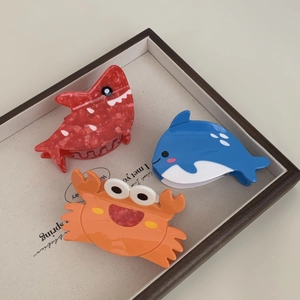 Lot de pinces à cheveux animaux marins avec requin rouge, dauphin bleu et crabe orange