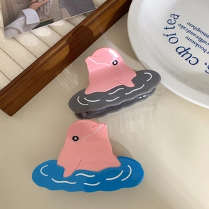 Pinces à cheveux dauphin rose avec accents de vagues d'océan en bleu et gris