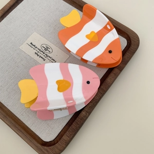 Cute clownfish hair clips in orange and pink acetate with yellow heart details