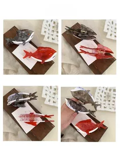 Macro detail of acetate shark hair claw clips in marble grey and red with metal spring