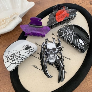 Gothic Halloween hair claw clip set featuring skull, spider web and witch hat designs