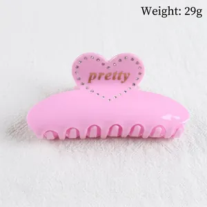 Pink heart hair claw clip with rhinestones and pretty text, measuring 10.5cm x 4.5cm