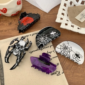 Gothic Halloween skull and spider web claw clips collection for spooky hair styling
