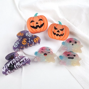 Set of Halloween shark hair claws with pumpkin ghost and purple patterns on white fabric