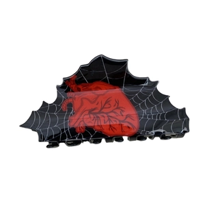 Gothic black hair claw clip featuring white spider web pattern and red heart design