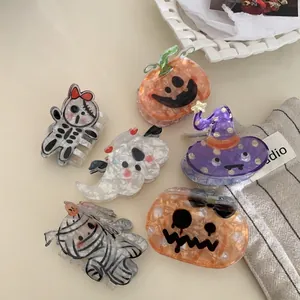 Halloween pumpkin hair claw clips set in acrylic material for spooky festive hair styling