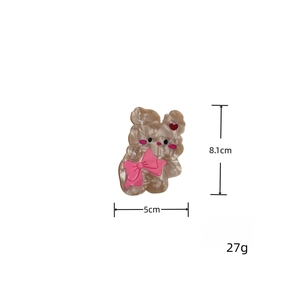 Dettaglio della molletta per capelli a coniglio in acetato 8,1x5 cm e peso di 27g