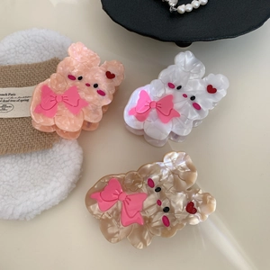 Mollette per capelli a coniglio in acetato con fiocchi in rosa, bianco e champagne