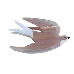 Pink and white swallow acetate hair claw clip with pearl finish for elegant styling