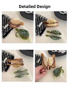 Détail d'une pince à cheveux tortue en acétate avec ressort doré haute qualité
