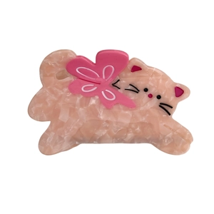 Pink marble pattern acetate hair claw clip with cute cat design and bow detail