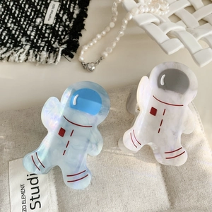 Creative astronaut acetate hair claws in iridescent light blue and marble white texture