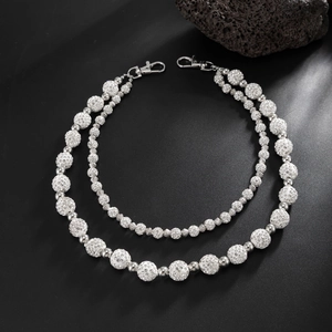 Close-up of double-layered silver diamond beaded chain with lobster clasps and macro details