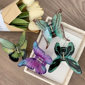 Pinces à cheveux papillon élégantes en couleurs variées avec une finition translucide