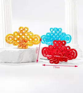 Detail view of Chinese knot hair claw clips in three colors with 79mm by 50mm dimensions