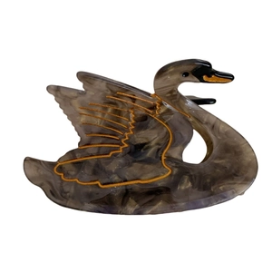 Elegant swan-shaped hair claw clip with grey marble acetate finish and gold trim detail