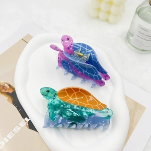 Set of 2 creative sea turtle hair claws in acetate with marble pattern and metal spring
