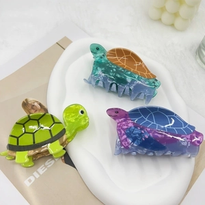 Three-piece ocean sea turtle acrylic hair claw clips in assorted shell patterns