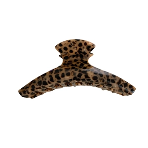 Elegant leopard print acetate hair claw clip with glossy finish for secure hair styling