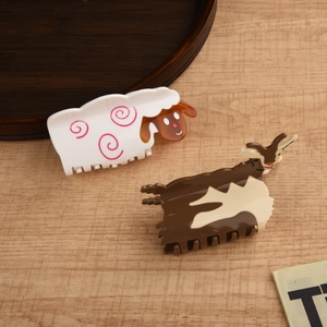 Cute acetate hair claws featuring sheep and goat animal shapes for stylish hair styling