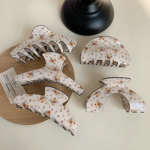 5-piece floral acrylic hair claw clip set with colorful patterns for women's hairstyling