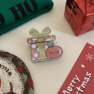 Rosa Glitzer-Weihnachts-Haarspange aus Acryl mit rotem Comic-Apfel-Detail