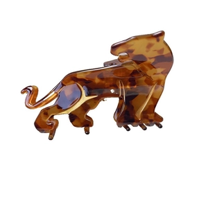 Leopard shaped acetate hair claw clip with classic tortoiseshell pattern and gold outlines