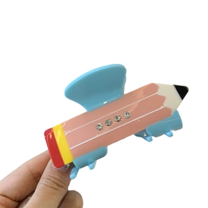 Cute pencil shaped hair claw clip in candy colors with rhinestones and acrylic finish