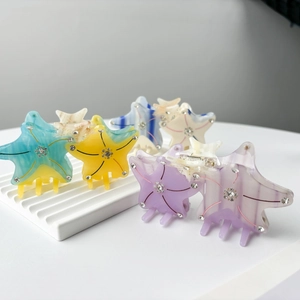 Starfish shaped acetate hair claw clips with rhinestones in multiple colors for women