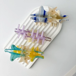 Ocean series starfish hair claws in marble acetate textures with subtle rhinestones