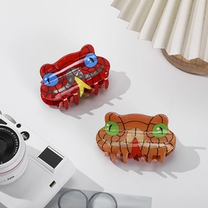 Unique snake-shaped acetate hair claw clips for women in red and orange colors