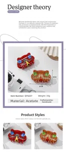 Detail view of acetate snake-shaped hair claw clips with size and weight dimensions