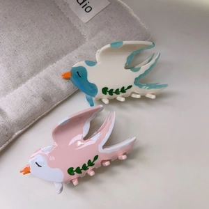 Pinces à cheveux hirondelles élégantes en acétate bleu et rose avec motifs de feuillage