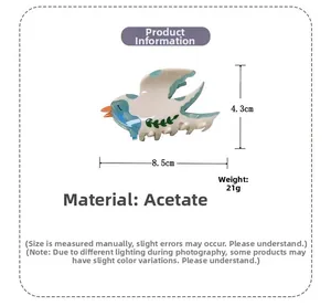 Détail de la pince à cheveux hirondelle en acétate avec dimensions 8,5cm x 4,3cm et 21g