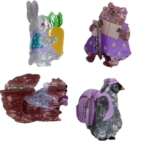 Cute acetate hair claws set featuring squirrel, rabbit, bear, and penguin animal designs