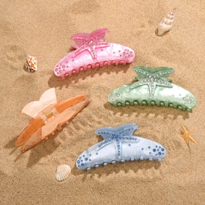 Starfish hair claw clips set with rhinestones in pink, green, orange and blue colors