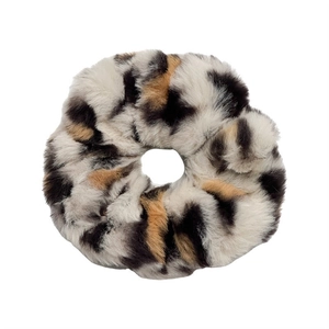 Faux fur leopard print scrunchie in black and brown for stylish winter hair styling