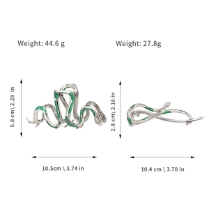 Silver snake hair claw clips with green enamel detailing and size measurements